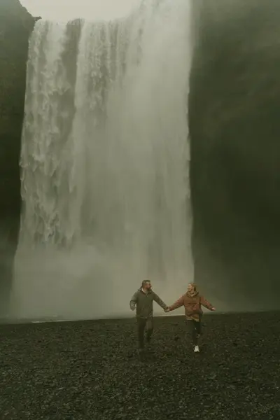 Proposal photoshoot at Skógafoss by Christine Q