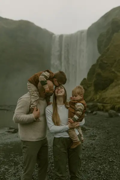 Family photoshoot at Skógafoss by Christine Q