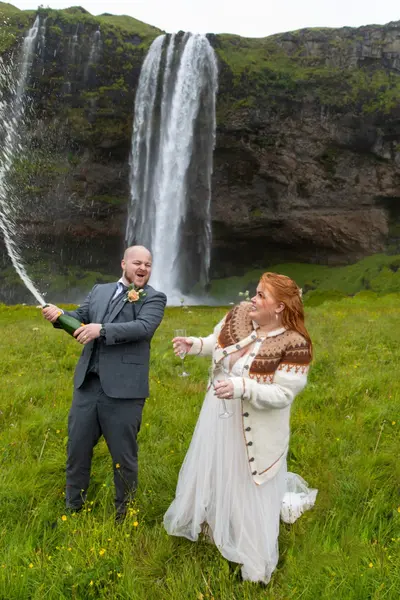 Wedding photoshoot at Seljalandsfoss by Annsy