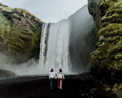 Couples photoshoot in Skógafoss by Misha M